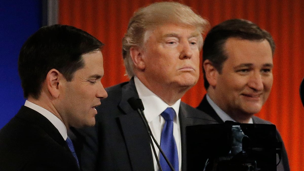 Republican US presidential candidate Donald Trump (C) talks with rival candidates Marco Rubio (L) and Ted Cruz (R) at the conclusion of the US Republican presidential candidates debate in Detroit. (Photo: Reuters)