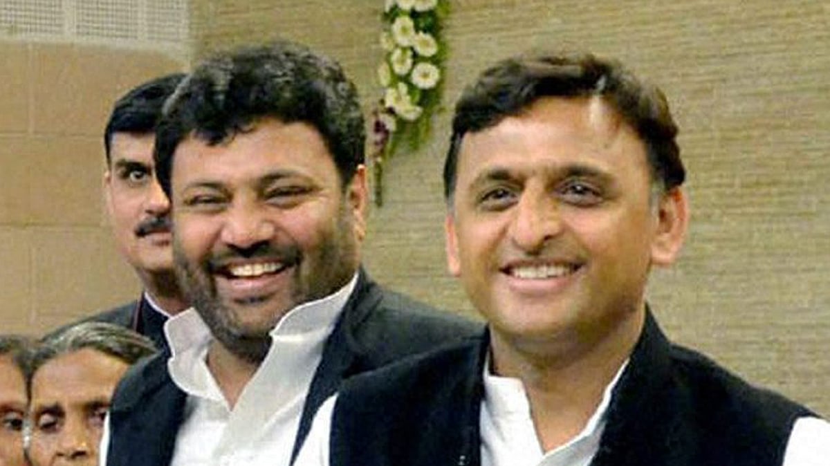 Uttar Pradesh Chief Minister Akhilesh Yadav with the beneficiary women during the launch of National Food Security Act, in Lucknow on Tuesday. (Photo Courtesy: PTI) 