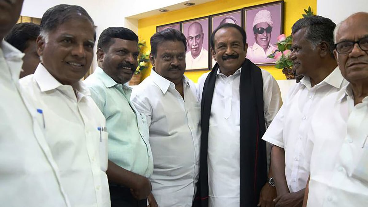 DMDK’s Vijayakanth with his new allies. (Photo: <i>The News Minute</i>)