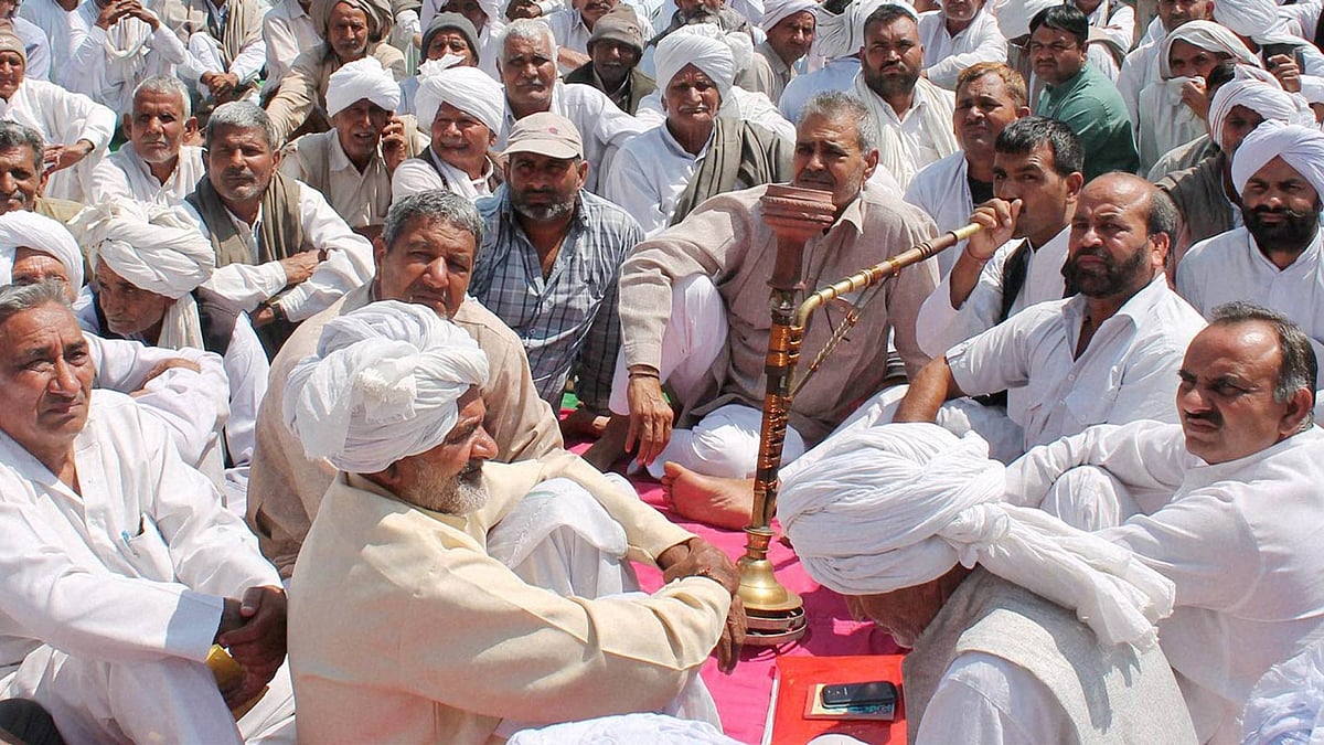 Members of Jat community during a day-long protest in Rohtak on Monday, 14 March 2016. (Photo: PTI)