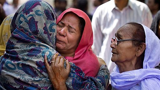 Women mourn the death of their family member who was killed in a suicide bombing, in Lahore. (Photo: AP/B.K. Bangash)
