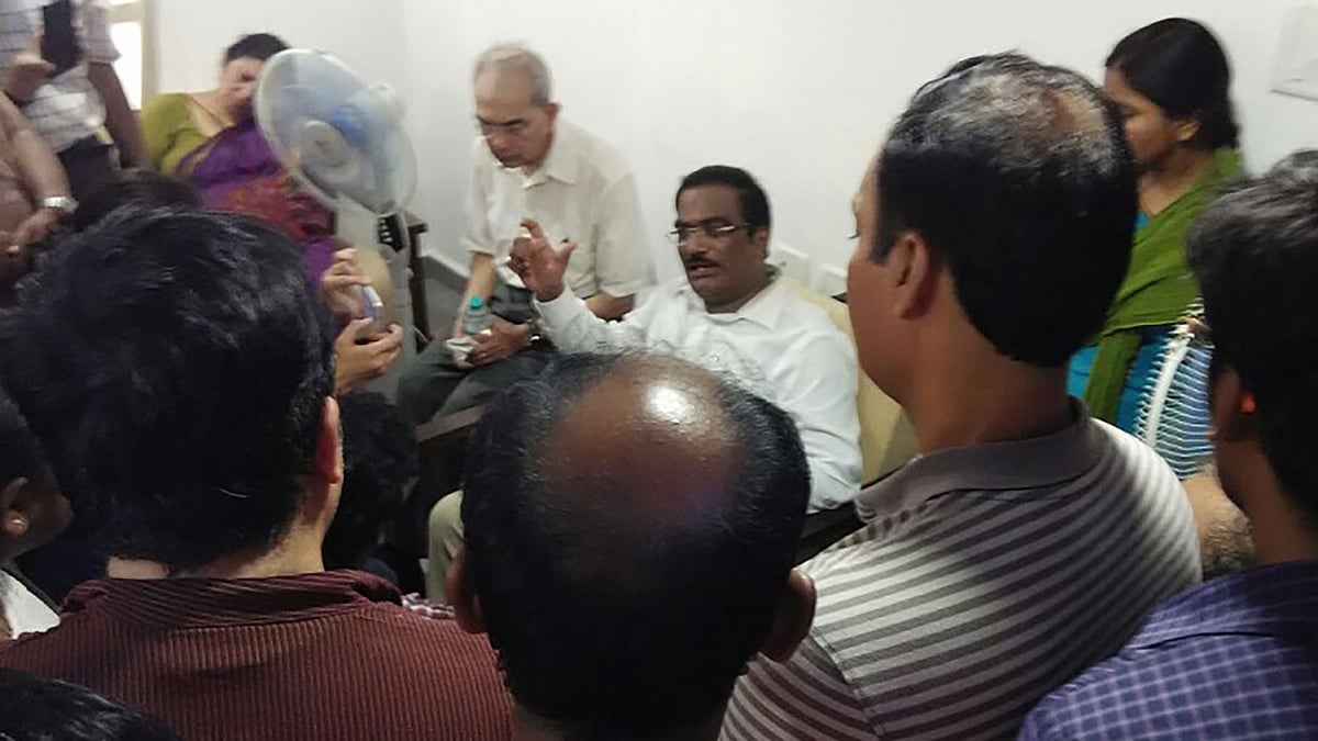 Appa Rao in his office after his return.
(Photo Courtesy: The News Minute)