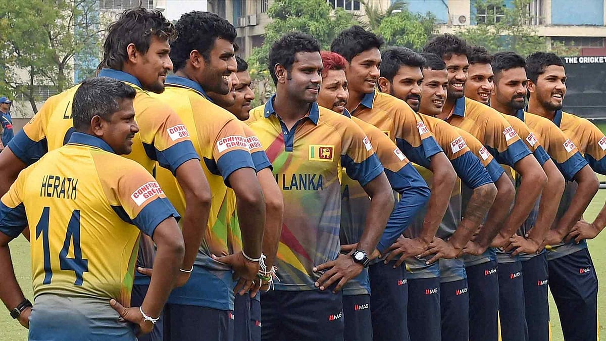 Sri Lanka cricketers pose for the cameras in a practice session in Kolkata on Saturday. (Photo: PTI)