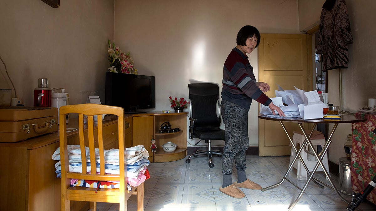 Dai Shuqina, lost her younger sister who was on the flight, along with her sister’s husband, son, daughter-in-law and grandson in Malaysian Arlines flight MH370. (Photo: AP)