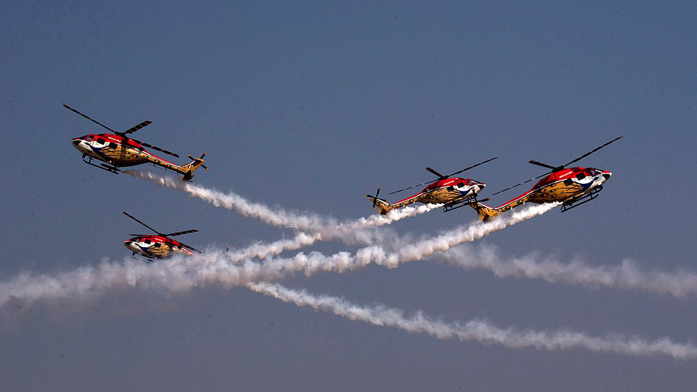 Indian Air Force Sarang Helicopter team display their skill during Air Force Day parade at Hindon Air Force base near New Delhi. (Photo: AP)