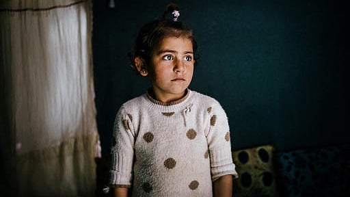 In this March 6, 2016 photo, Winda Farman Haji poses for a portrait inside the tent she shares with her family at Kawergosk refugee camp in Iraq. (Photo: AP)