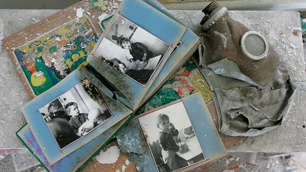 Abandoned photo albums next to a gas mask in the nuclear township of Chernobyl, 3 kms from the nuclear plant. (Photo: Reuters) 
