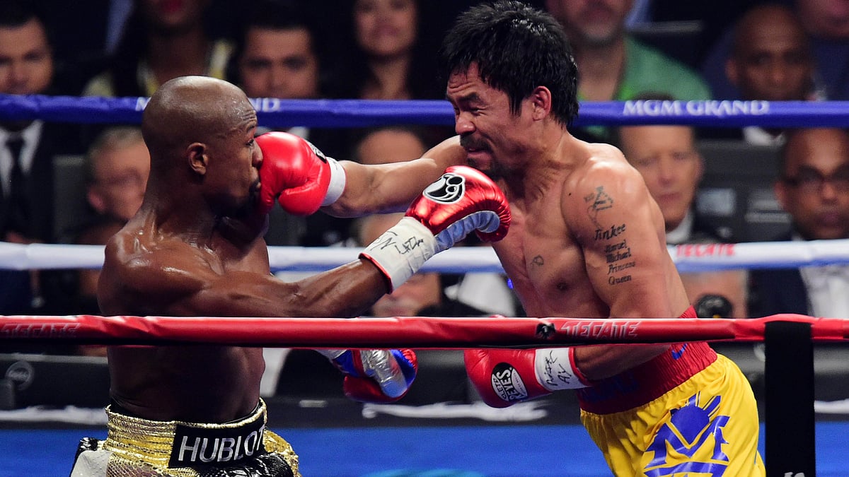 Floyd Mayweather and Manny Pacquiao box during their world welterweight championship bout in May, 2015. (Photo: Reuters) 
