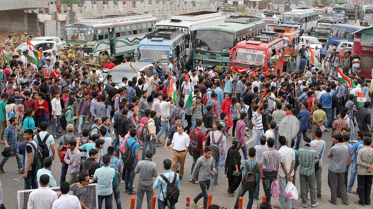 Students of Jammu University protest against the police action on non-Kashmiri students in NIT Srinagar, in Jammu on Wednesday, 6 April 2016. (Photo: PTI)