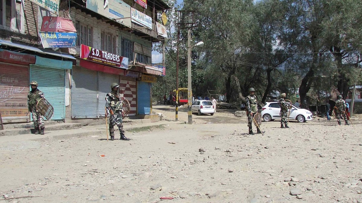 Security personnel enforce curfew in Kupwara of Jammu and Kashmir on 17 April 2016. (Photo: IANS)