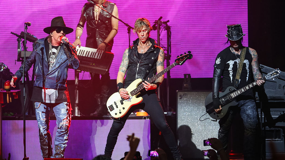 In this April 23, 2014 file photo, Axl Rose, from left, Duff McKagan and DJ Ashba of Guns N’ Roses perform on stage at the 6th Annual Revolver Golden Gods Award Show at Club Nokia in Los Angeles. (Photo: AP)