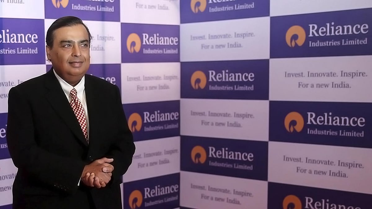 Mukesh Ambani, chairman of Reliance Industries Limited, poses for photographers before addressing the annual shareholders meeting in Mumbai. (Photo: Reuters)