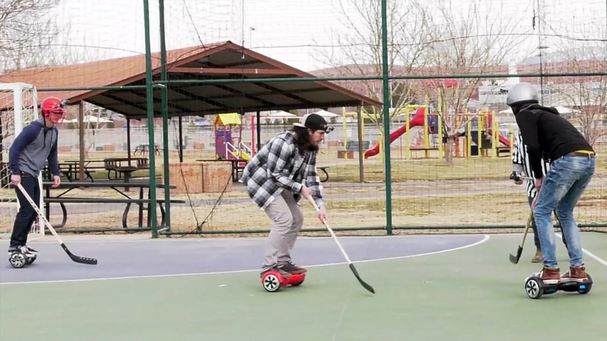 A futuristic hockey match, played on hoverboards. (Photo: AP/Caters News screengrab)