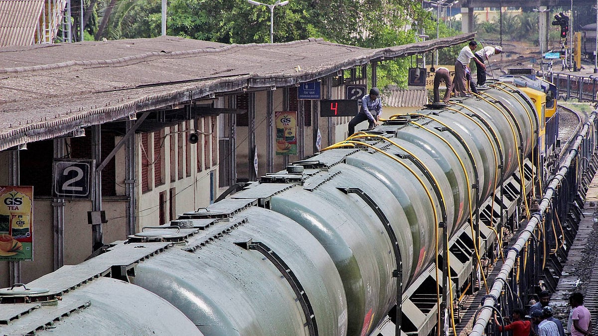 Workers fill water in Central Railway train tanks to transport to drought affected Latur District from Miraj station near Sangli. (Photo: PTI)