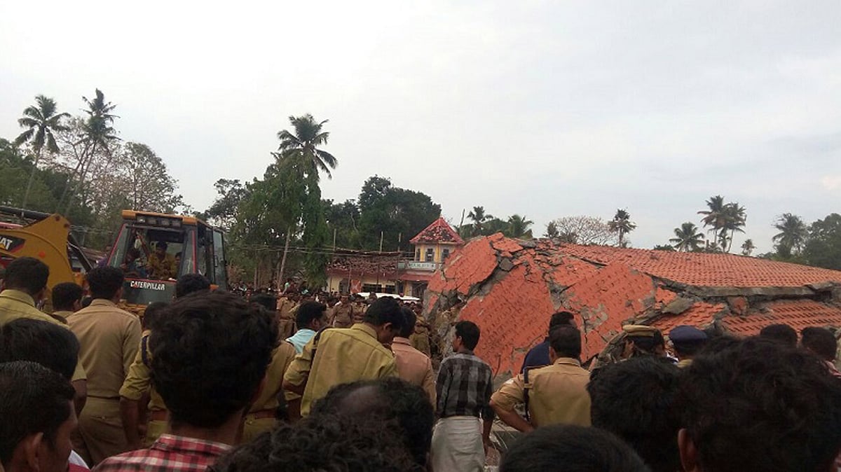 The collapsed roof of the Paravur Puttingal temple’s storeroom at Kollam in Kerala. (Photo: The News Minute)