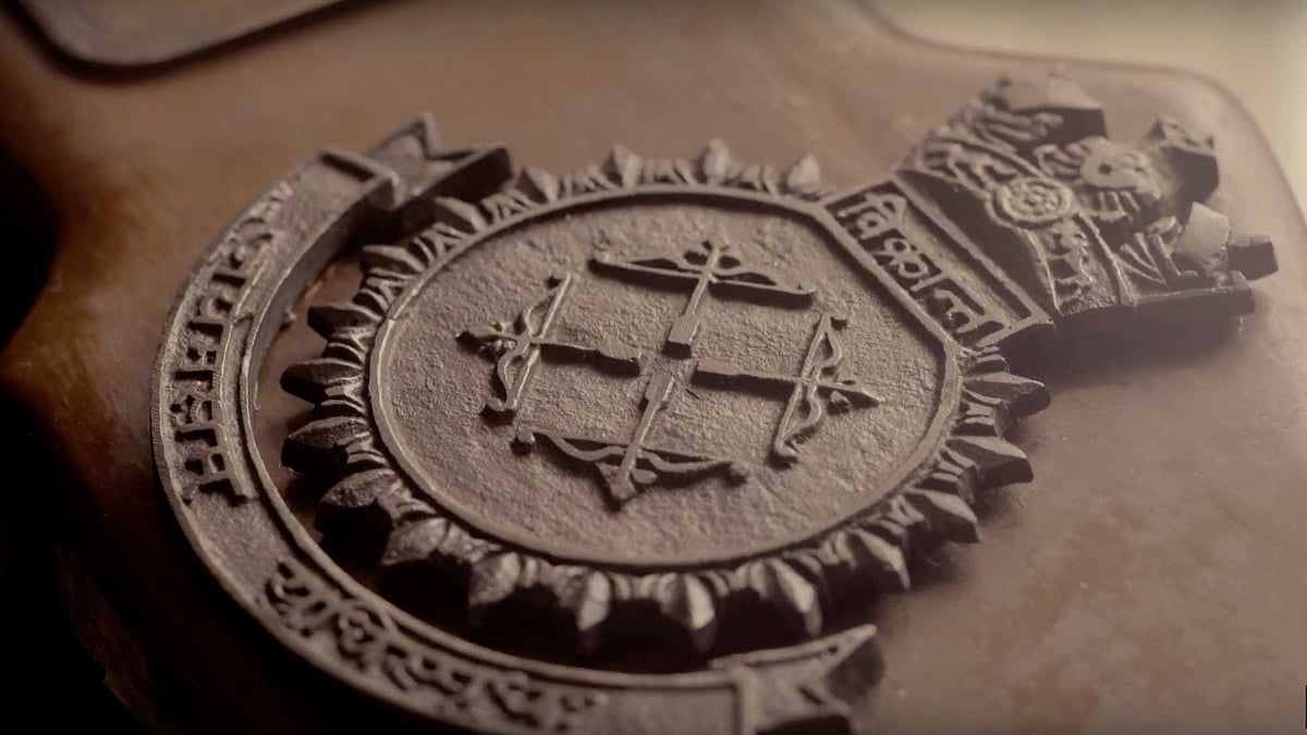 The invincible INS Vikrant emblem. (Photo: Bajaj)