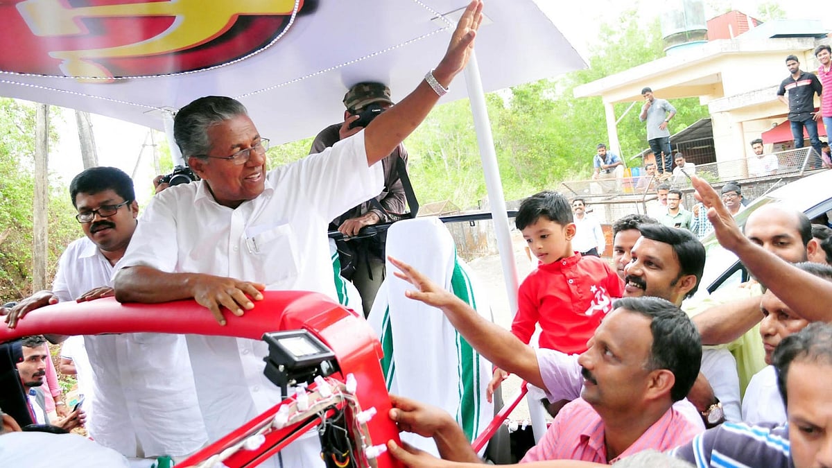 CPI-M leader and Kerala’s new Chief Minister Pinarayi Vijayan celebrates party’s performance in the Assembly polls in Kannur. (Photo: IANS)