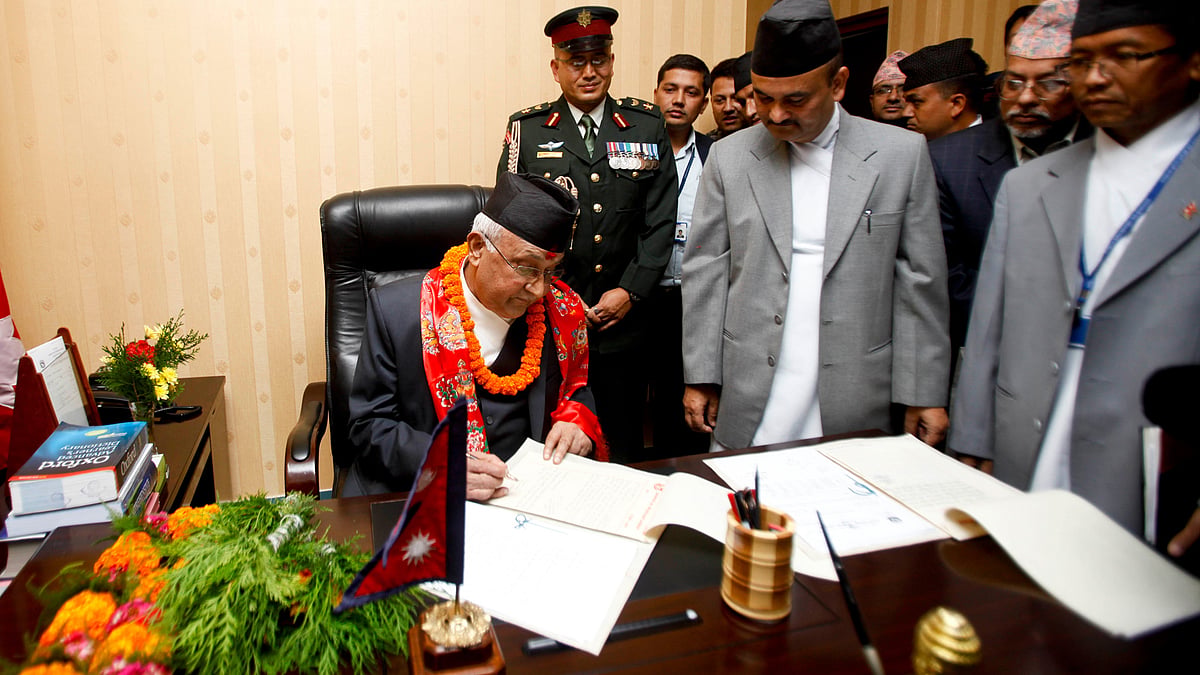 Nepal’s Prime Minister Khadga Prashad Oli assumes his post at his office in Kathmandu October 2015. (Photo: IANS)
