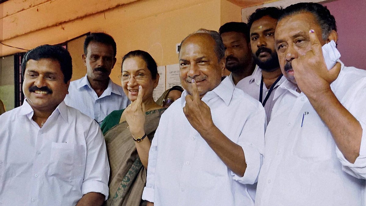 

Congress veteran and former Defence Minister AK Antony with his wife Elizabeth Antony and MM Hassan, Vice President of the Kerala Pradesh Congress Committee (KPCC), after casting his vote in Thiruvananthapuram on Monday. (Photo: PTI)