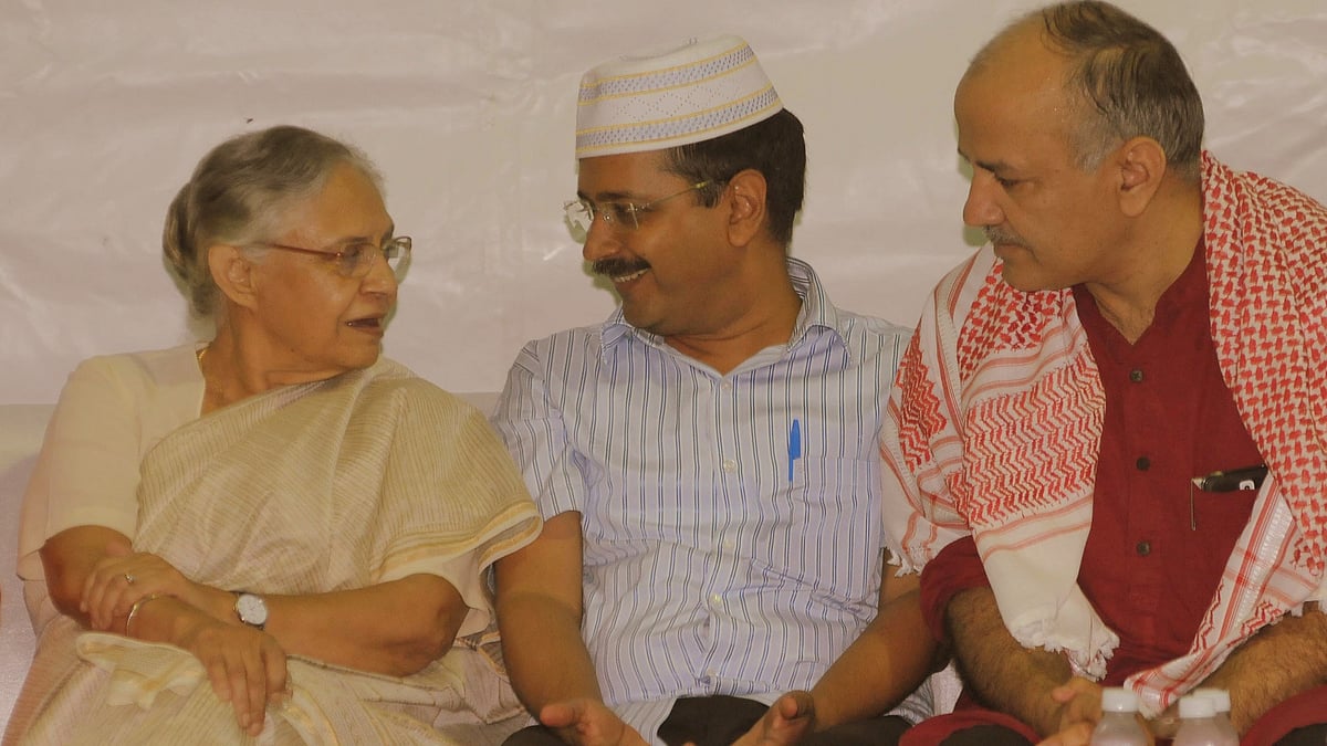 Delhi Chief Minister Arvind Kejriwal, Deputy Chief Minister of Delhi Manish Sisodia and former Delhi Chief Minister Sheila Dikshit other during an Iftaar party hosted by Kejriwal in New Delhi on 12 July  2015.