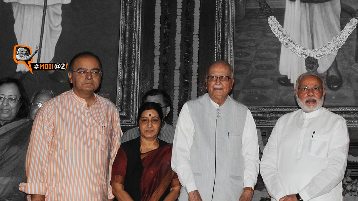 Prime Minister Modi with ministers Arun Jaitley and Sushma Swaraj, and LK Advani. (Photo: altered by <b>The Quint</b>)