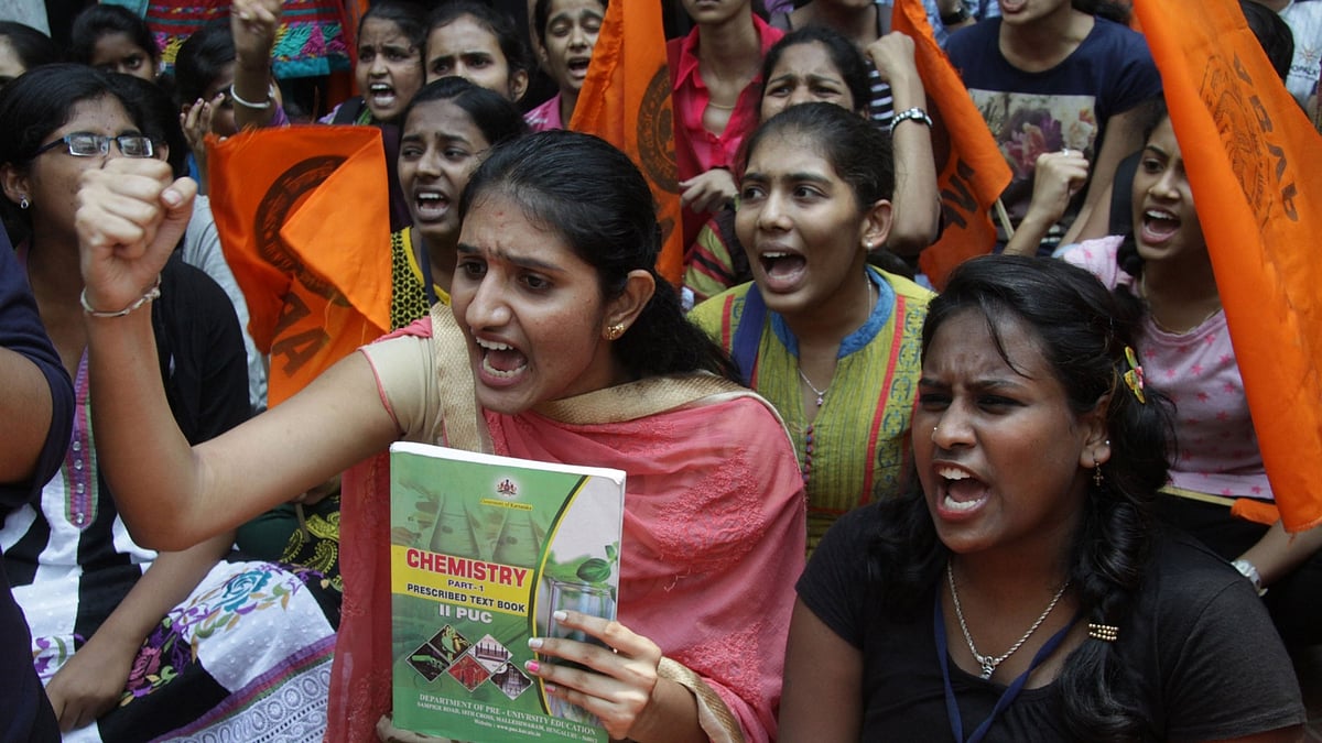  Students protest in front of Department of Pre-University Education (DPUE) in Bengaluru, on 31 March 2016. (Photo: IANS)