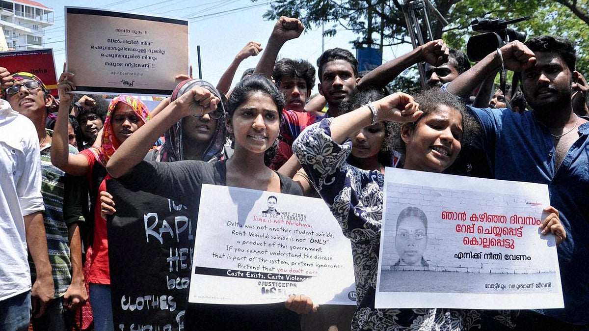 Students hold a protest march demanding justice in the rape and murder case of a law student, in Kochi, Kerala on Tuesday. (Photo: PTI)
