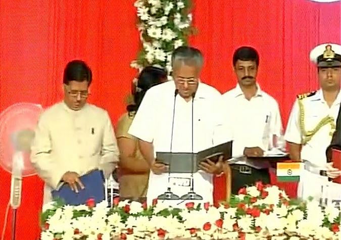 Pinarayi Vijayan takes oath as Kerala’s new Chief Minister in the swearing-in ceremony at Thiruvanantharapuram, Kerala. (Photo Courtesy: Twitter/ANI_news)