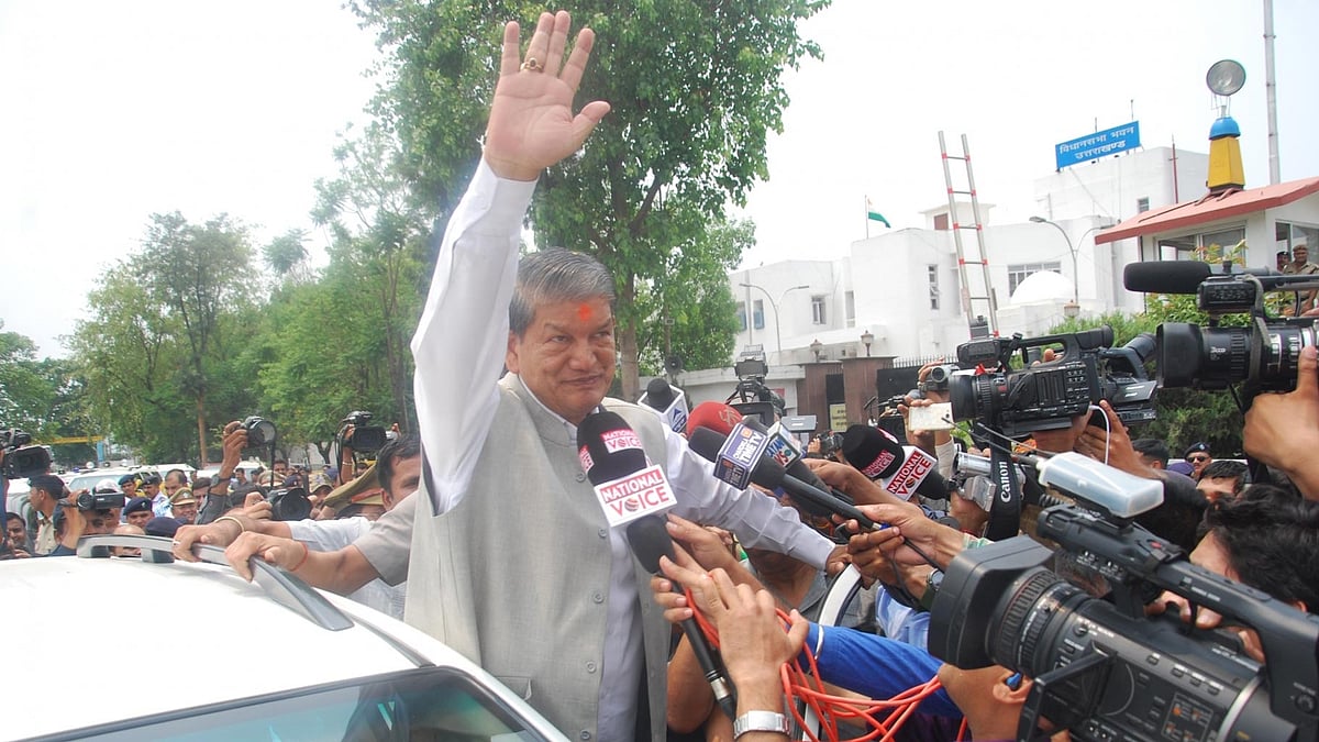 Ousted Uttarakhand Chief Minister Harish Rawat greeting supporters after taking the floor test in Dehradun on 10 May 2016. (Photo: IANS)
