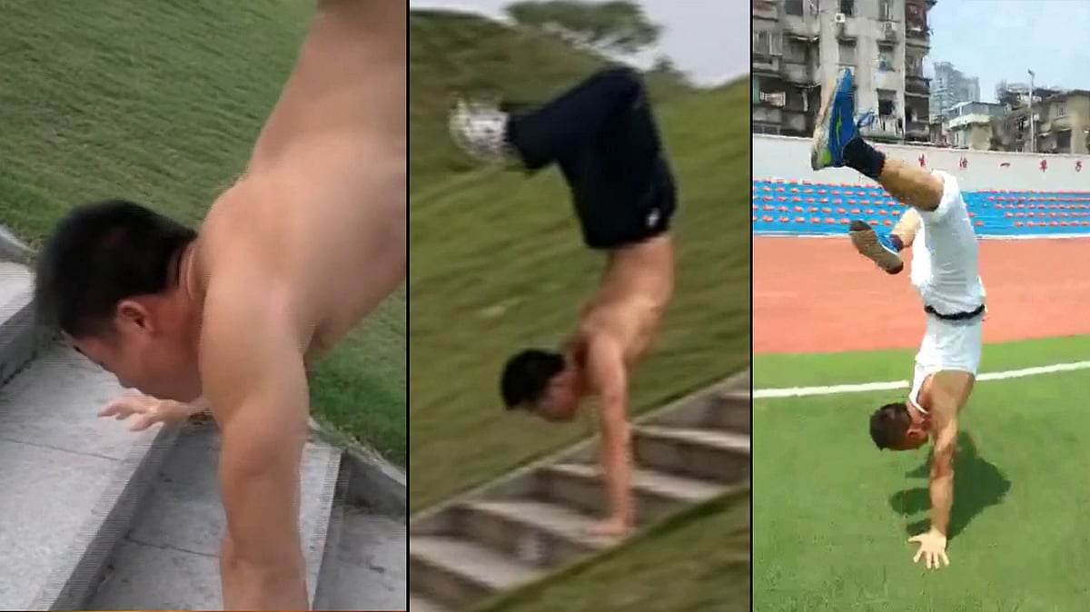 Fan Congcong took 31 seconds to walk up the stairs on his hands to break the world record. (Photo: AP screengrab)