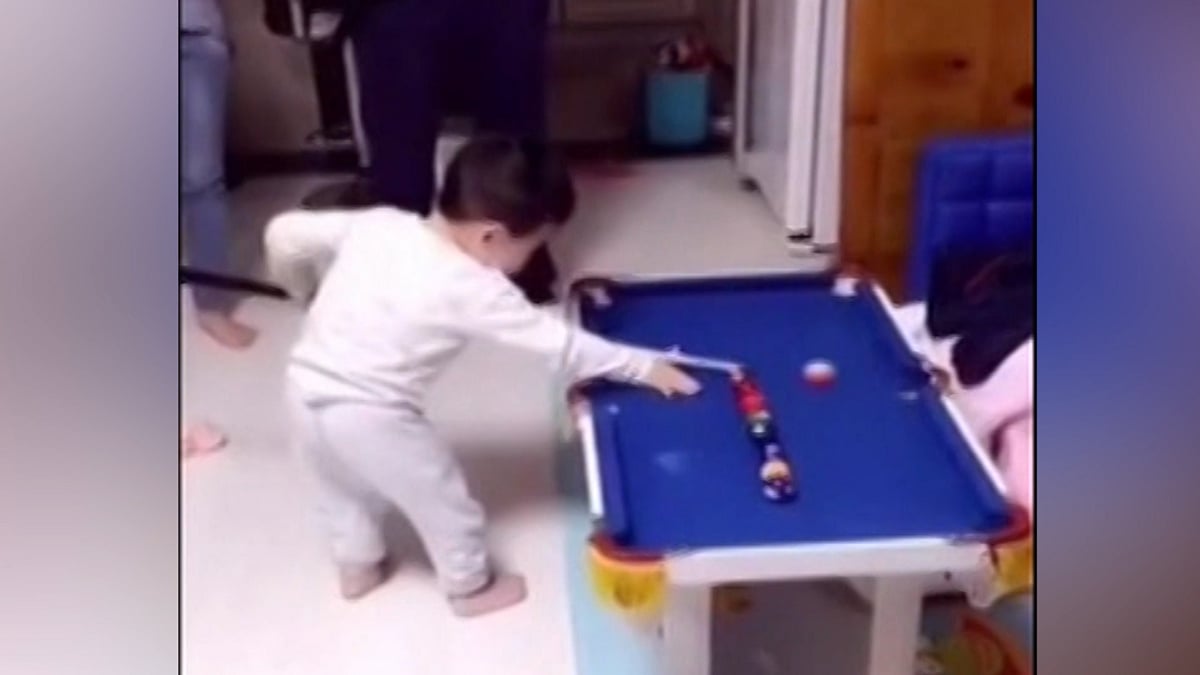 The young snooker masters knocking balls into the pockets one-by-one with astonishing accuracy. ( Photo: AP screengrab)
