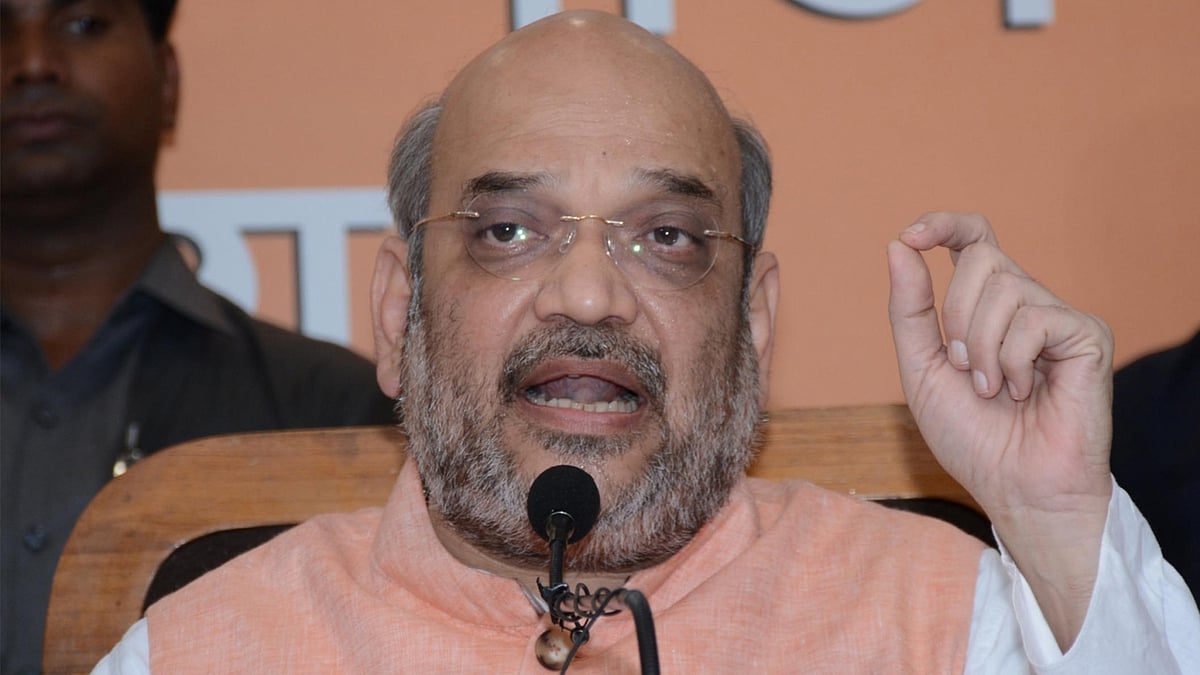 BJP Chief Amit Shah addresses a press conference in Lucknow on Tuesday. (Photo: IANS)