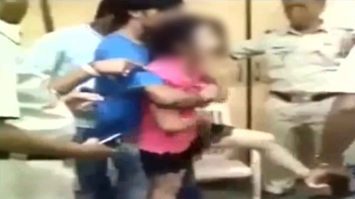 A still from the video which shows the girl creating ruckus in the police station in Mumbai. (Photo Courtesy: ANI Screegrab)