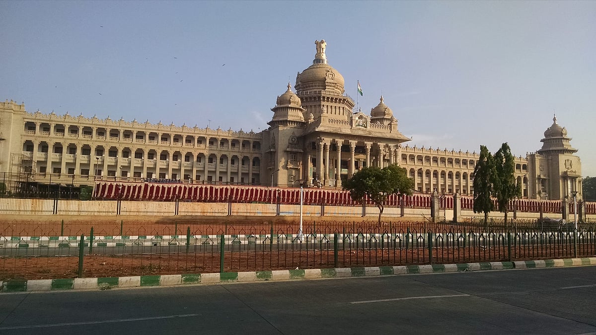 Karnataka Legislative Assembly. (Photo Courtesy: <a href="https://www.facebook.com/photo.php?fbid=467612926777538&amp;set=bc.Abr96DNYHzG0qu5f-OMWtfbTdSG6mLHgbphppHTDZw_ohuEnp5ydMEQoVq7weQ5UKVjQIpCuvE-XbivpNQxoOvKP0EbaCZBAX1L4hMNsqVLkbwVW258GCTeDmI7rsHTvkhg&amp;type=1&amp;opaqueCursor=AbpjELDQNBh7chQjSAzetu-lVz75OQoKJQ4Phqp1k9MIxt6dxXAGtRsLm8ANszD_b3FrH1y7Z11iCYMIlMCwOVUgiUpTZ7CBEZprjno7GYhKRNADL6aUvP8dXJ2MO0LtqhbCKyTBc031o2adHyHC5WXgSGDrJXCq3433UbDjeDR0xKMk9lG55MbTYtehpVXCOSisgd7jDDDVR2l3jgokmc3knb0wWEC_ZlVaJzIBu43oC4CZYN82qOUs5lSDpi20eR75tjNp5JvuVW1W0uBi62WhNrV299P1D5ffc040MwQcnnb8omkSUrCo3Y5EGnbaD4Y5HmhX5izTdQJsCkh1gXOwBfF0SQpFxJr7VXvLdF8qEg&amp;theater">Facebook</a>)