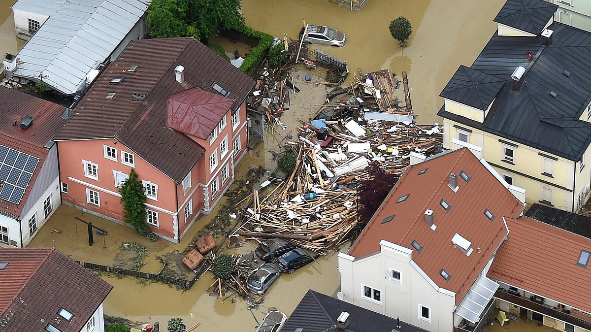 An aerial view shows the flooded streets and damages in Simbach am Inn, southern Germany, Thursday 2 June 2016. Several people died when the small town was hit by heavy flooding the day before. ( Photo: AP/Tobias Hase/dpa)