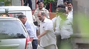 Virendra S Tawde being taken away after produced before the Sessions Court for alleged involvement in the 2013 murder of rationalist Narendra Dabholkar. (Photo: IANS)