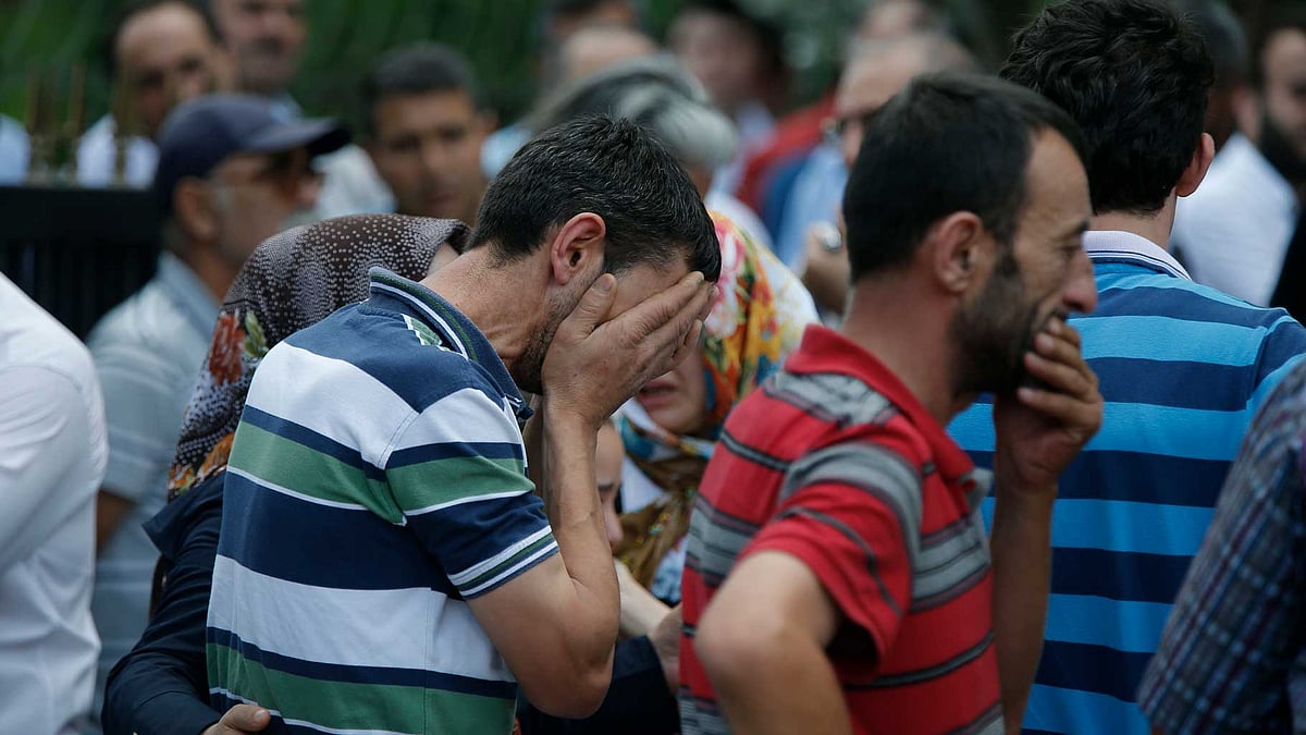 Family members of victims cry outside the Forensic Medical Center in Istanbul. (Photo: AP)