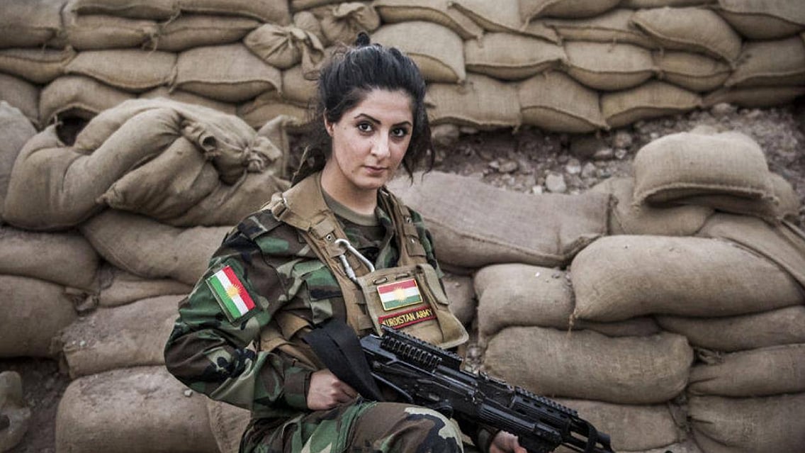 Joanna Palani, the Kurdish European, in military fatigues. (Photo Courtesy: Facebook/<a href="http://https://www.facebook.com/Joanna-Palani-Fan-Club-1679359135684504/photos_stream">Joanna Palani Fan Club</a>)