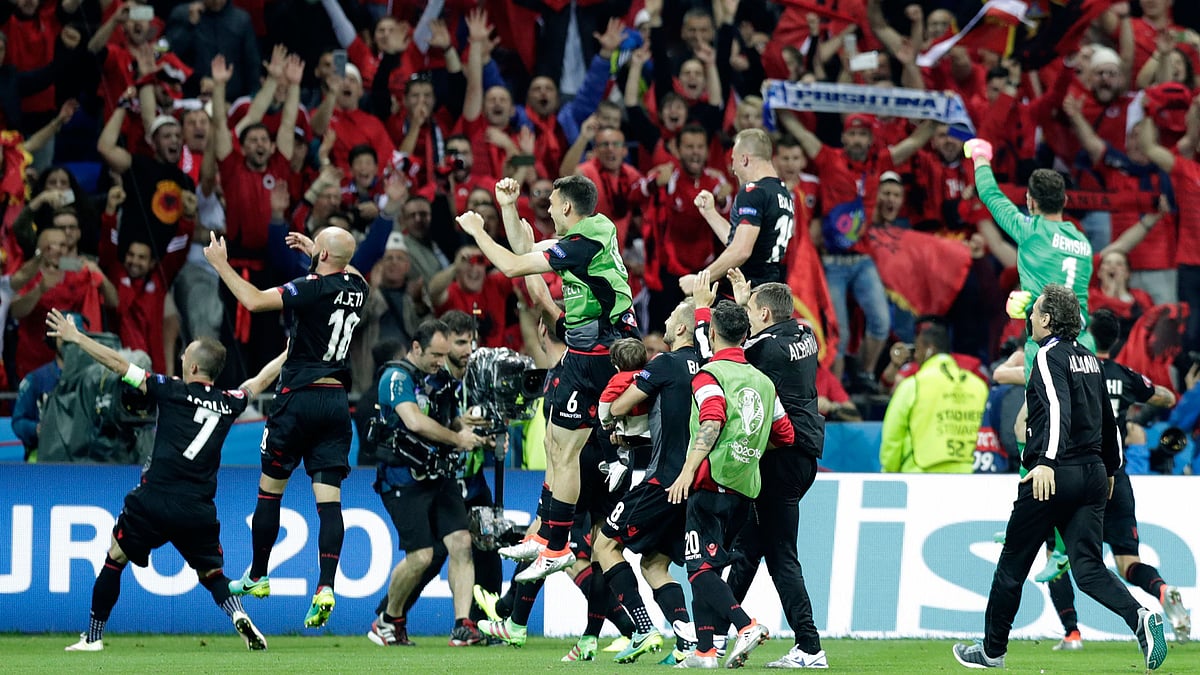 Albanian players celebrate their victory after Euro 2016 Group A soccer match. (Photo: AP)