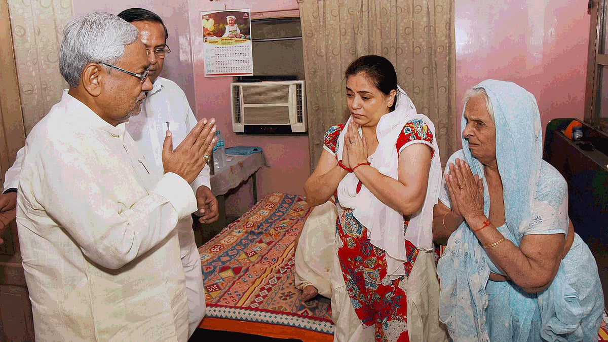 Bihar CM Nitish Kumar meets the family members of Aditya Sachdeva who was killed by the son of a JD(U) MLC, in Gaya on Friday. (Photo: PTI)