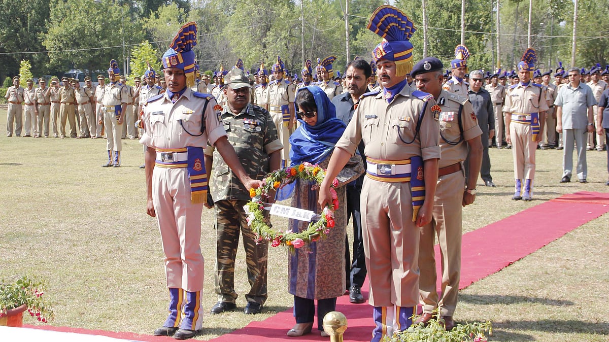 Jammu & Kashmir Chief Minister Mehbooba Mufti lays wreath at the coffins of CRPF martyrs. (Photo: IANS)