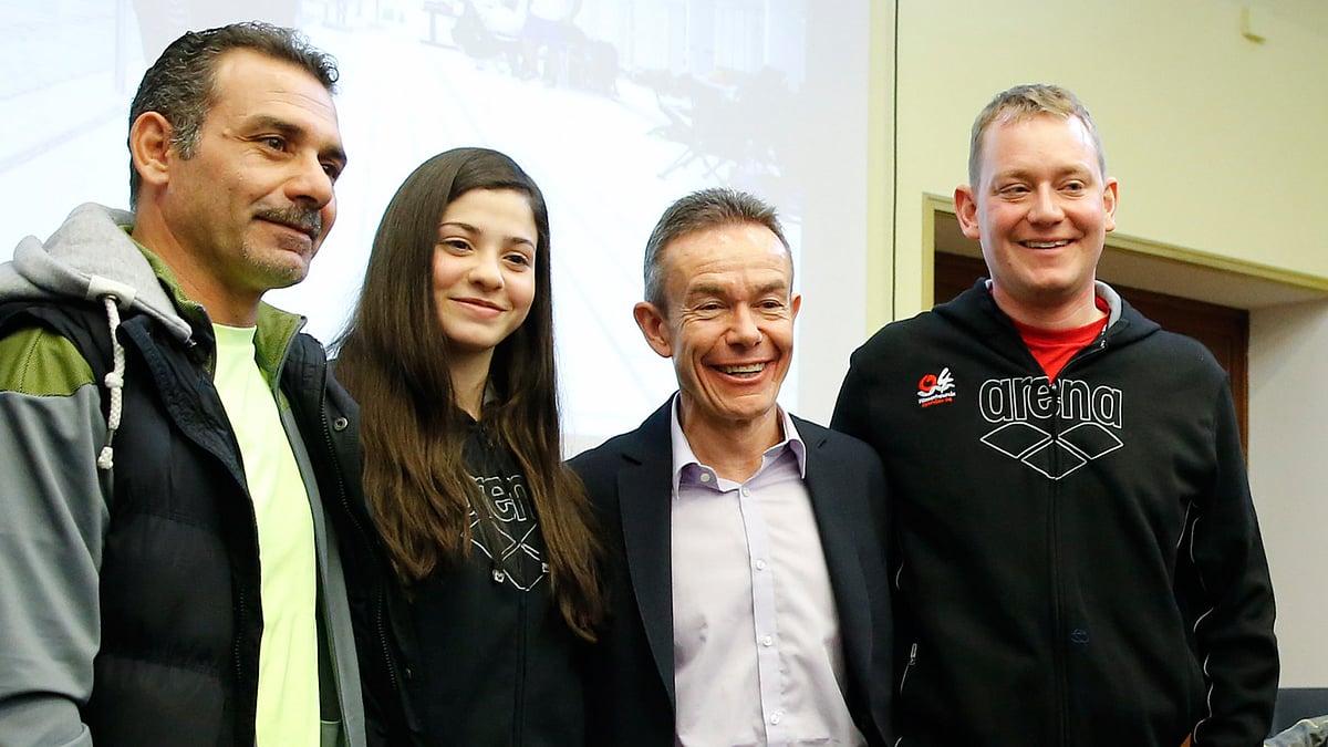 Syrian swimmer Yusra Mardini, her father Izzet (left) Pere Miro (2nd right) Deputy Director General for Relations with the Olympic Movement at the International Olympic Committee (IOC) and coach Sven Spannekrebs (right) of Wasserfreunde Spandau 04 in Berlin, Germany. (Photo: Reuters/Fabrizio Bensch)