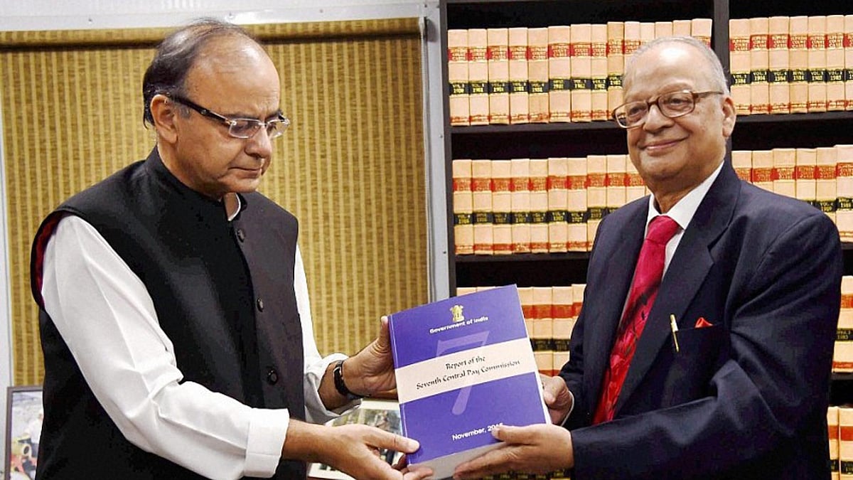 Justice AK Mathur submitting the Commission report to Finance Minister Arun Jaitley (left) in November 2015. (Photo: PTI)