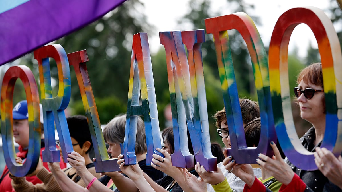 Members of the LGBTQ community spell ‘Orlando’ in honour of the victims of the shooting. (Photo: AP)