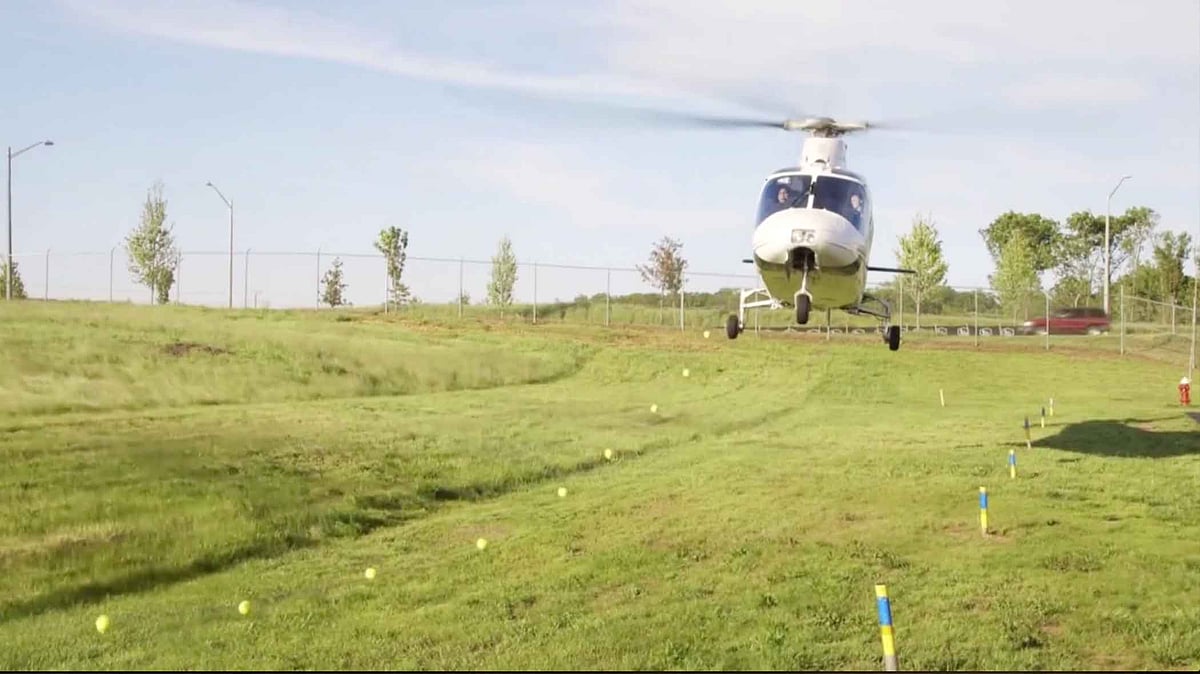Rick Rahim, a commercial helicopter pilot, pulls out his son’s loose tooth using a helicopter. (AP Screegrab)