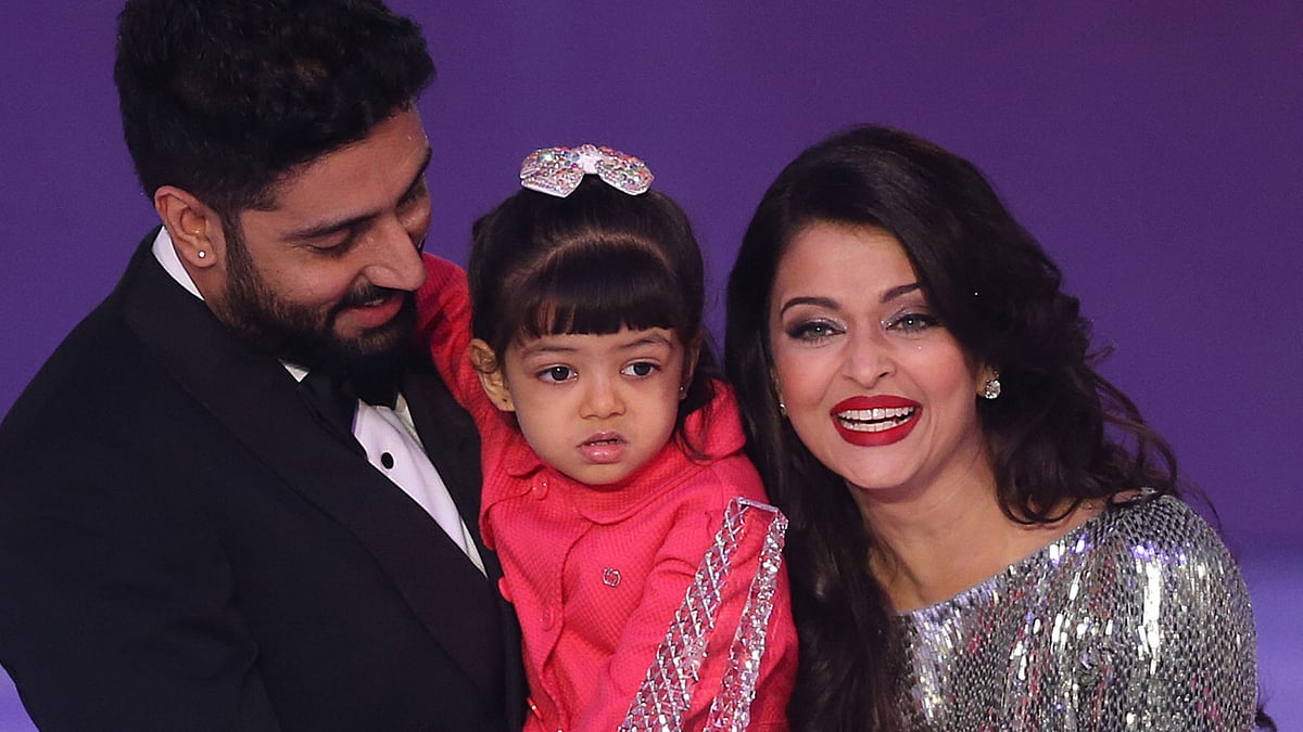 Abhishek with Aaradhya and Aishwarya Rai Bachchan.