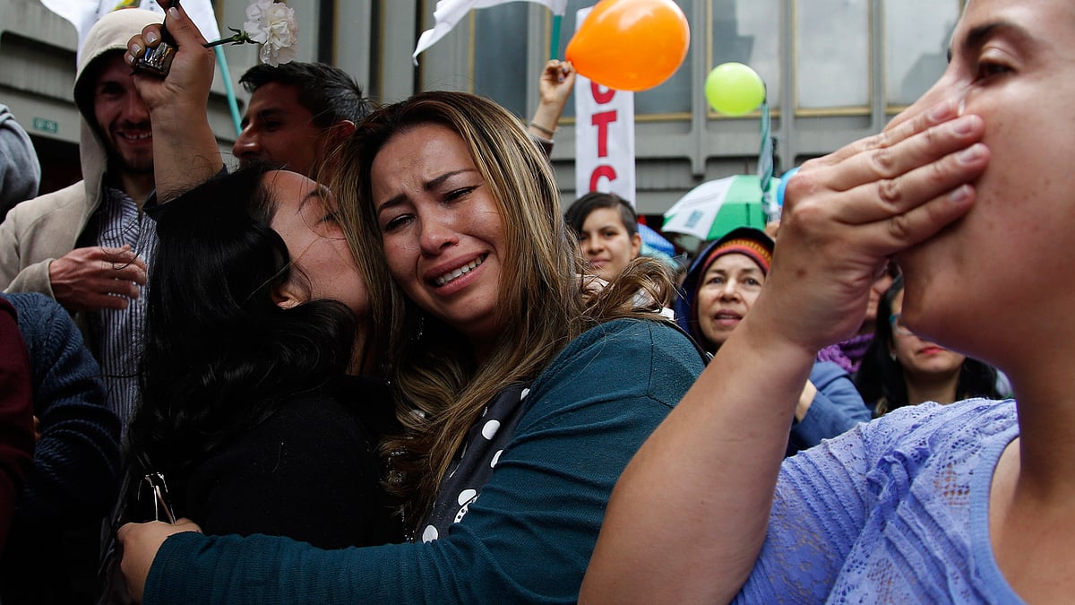 People celebrate the agreement between Revolutionary Armed Forces of Colombia, FARC, and Colombia’s government, in Bogota, Colombia. Photo used for representational purpose. (Photo: AP)