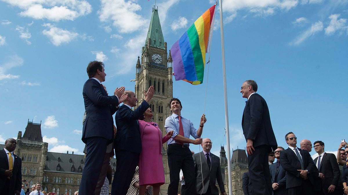 Justin Trudea hoists the Pride flag at Parliament Hill, Ontario, Canada. (Photo: Reuters)