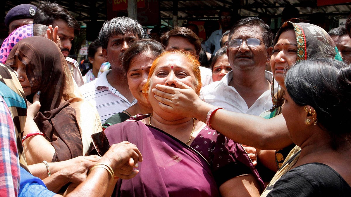 

Family members of the Gulbarg Society massacre case convicts react after the verdict in the case by a special SIT court in Ahmedabad on Thursday. (Photo: PTI)
