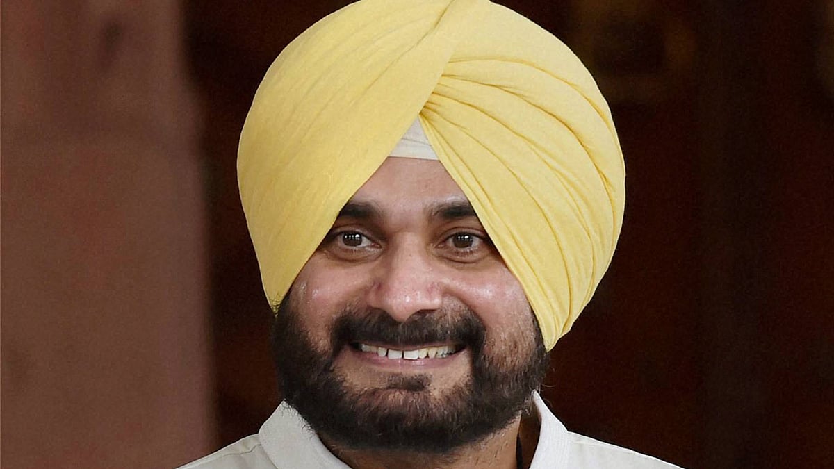 Navjot Singh Sidhu comes out of Parliament House after resigning from Rajya Sabha as MP on the first day the Monsoon Session on Monday. (Photo: PTI)